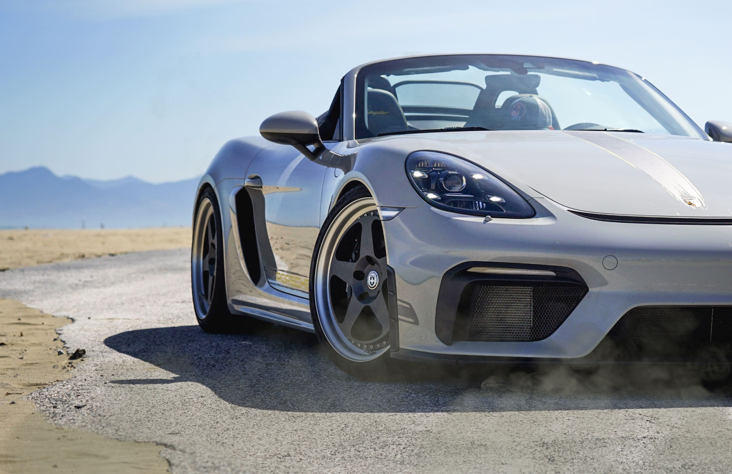 Front view of Porsche 718 Spyder on custom HRE 305 forged wheels
