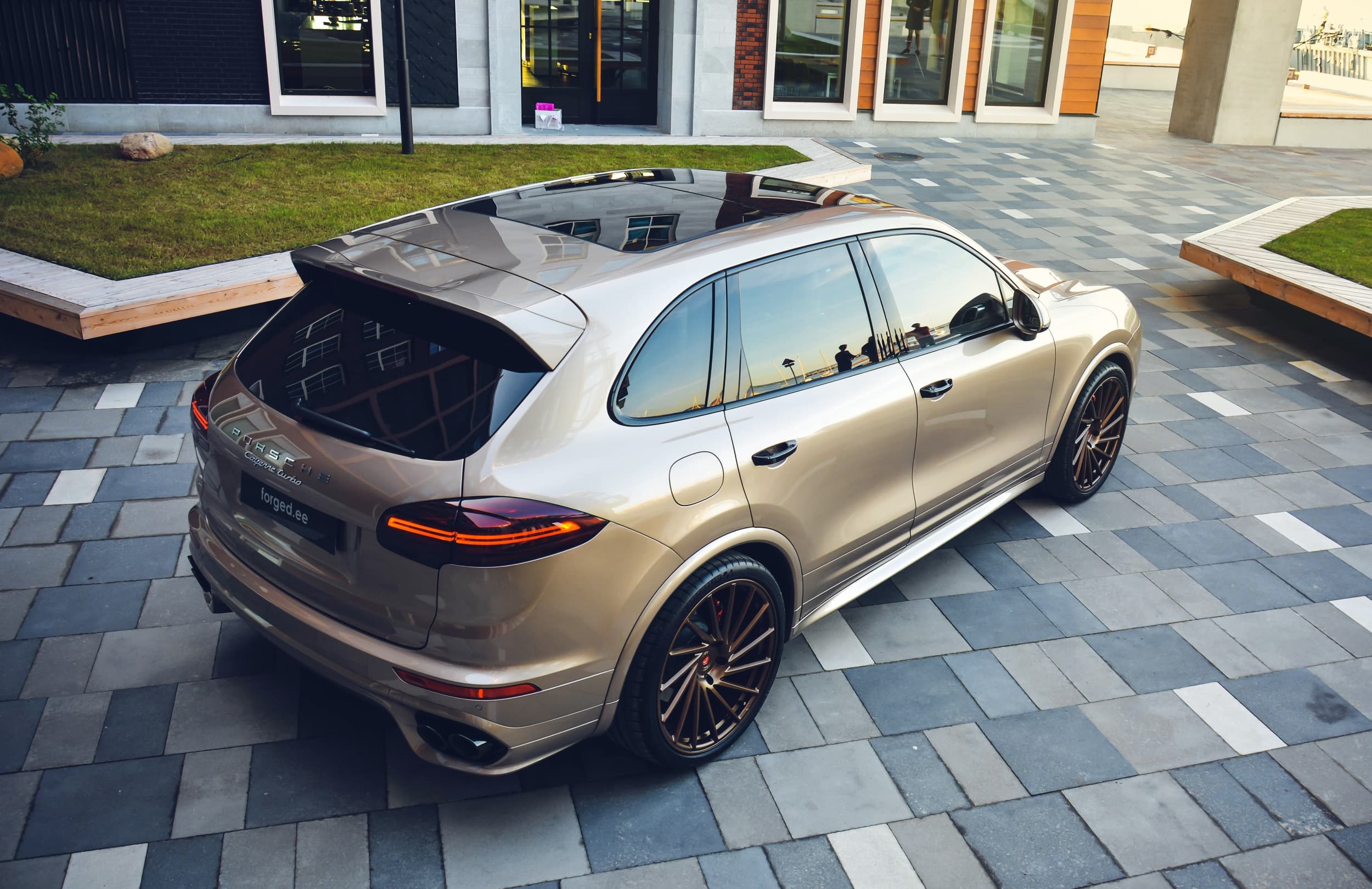 Rear three-quarter view of Porsche Cayenne Turbo with Satin Bronze Vossen forged wheels