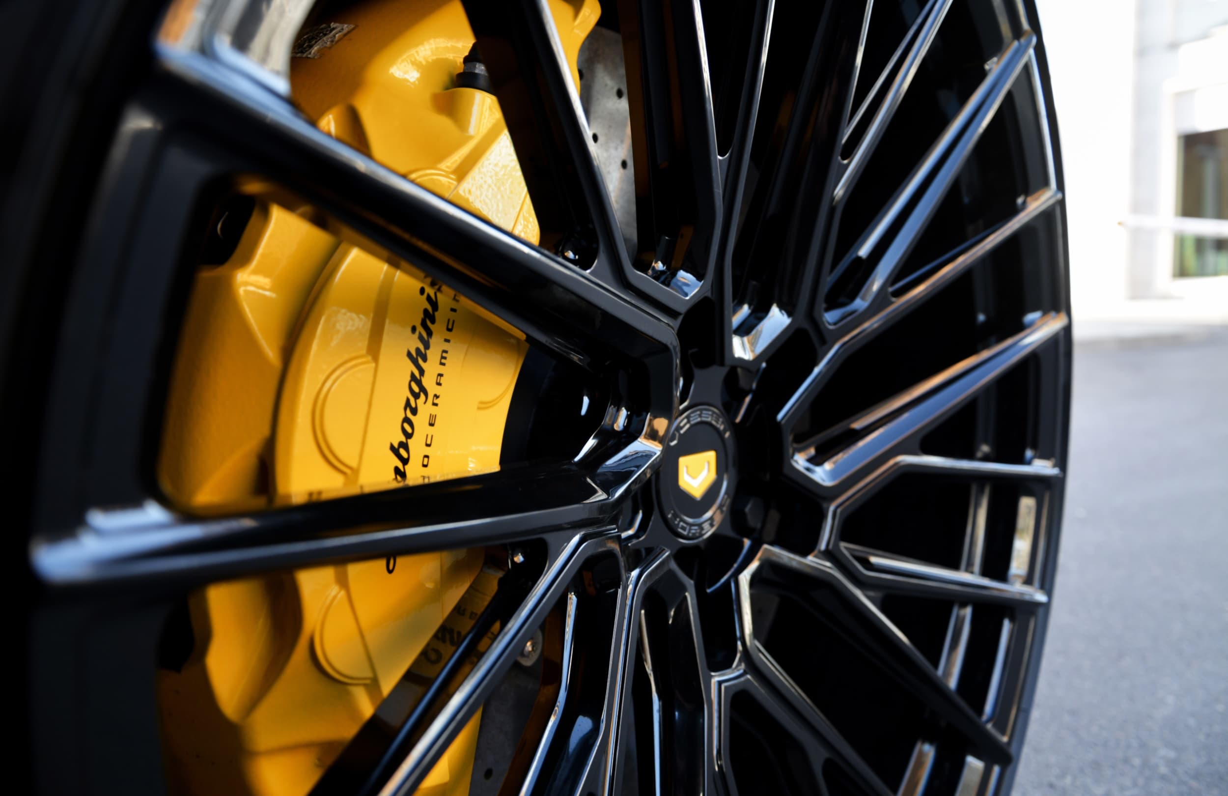 Close-up of Vossen EVO-6TR forged wheel with yellow center cap